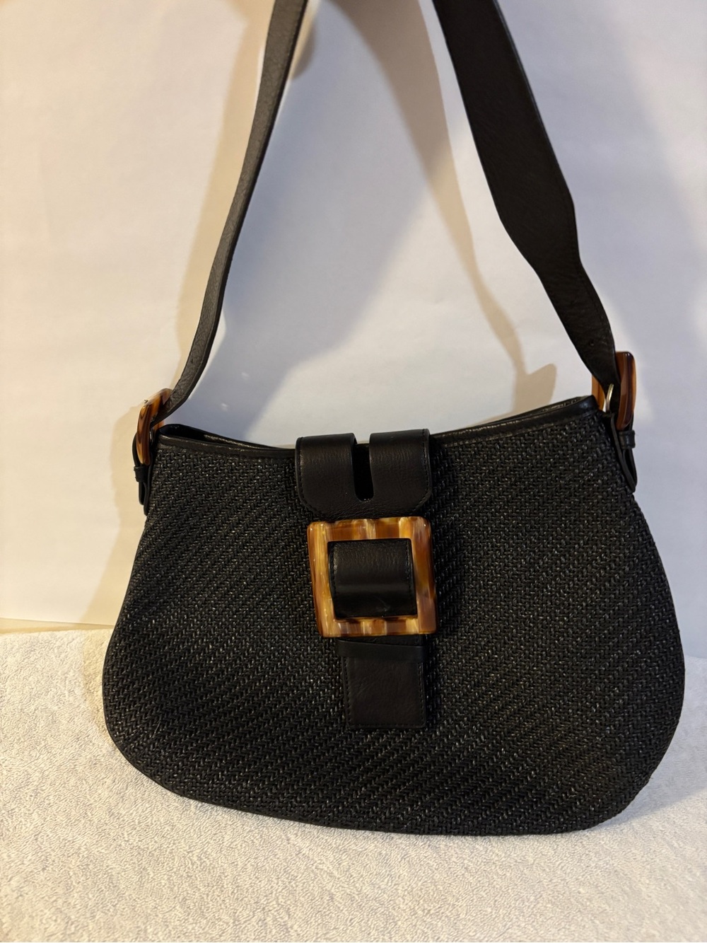 Classic Black Woven Rattan Shoulder Bag with Tortoiseshell Accent